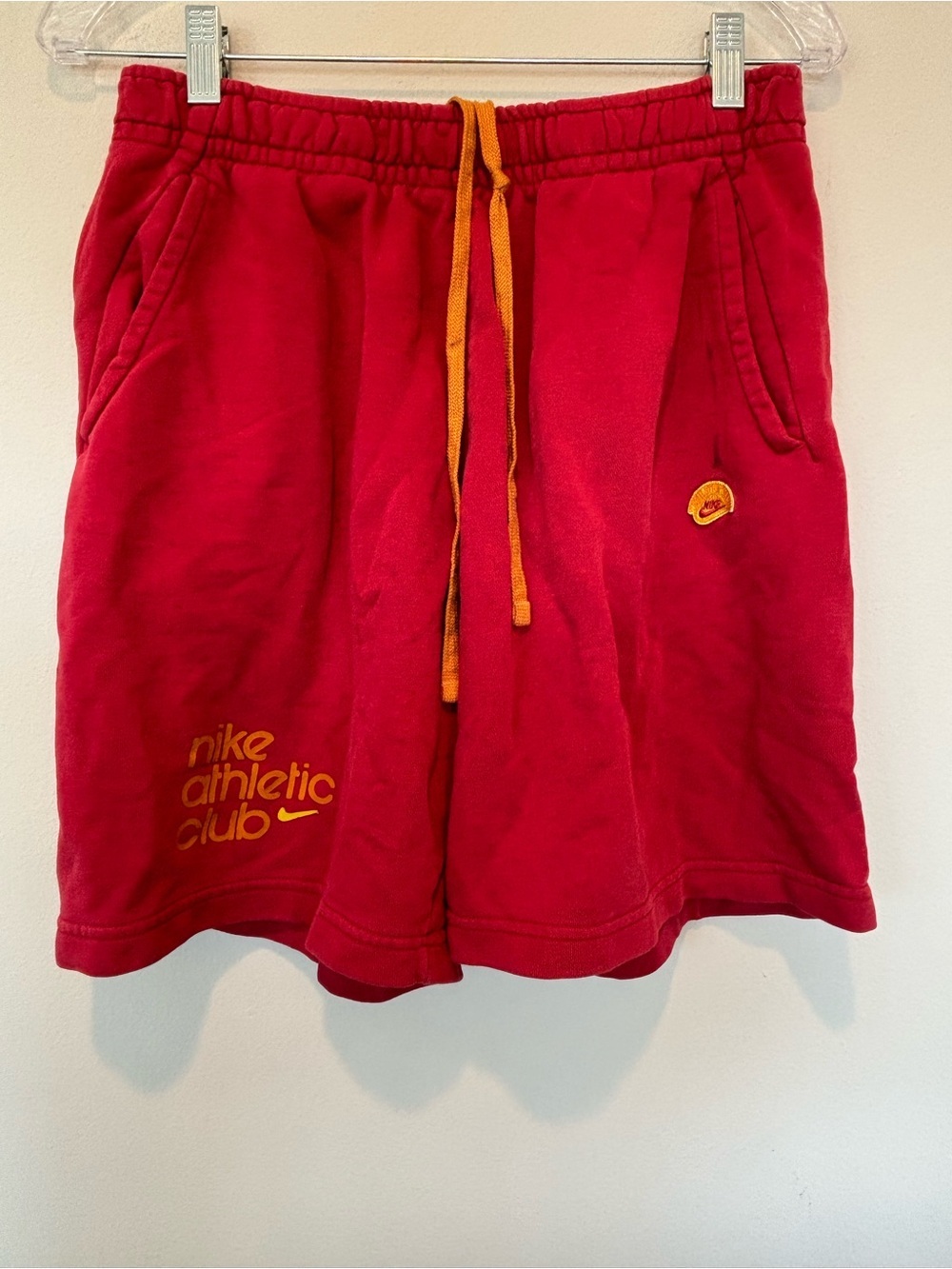 Nike Red Shorts with Orange Drawstring and Logo